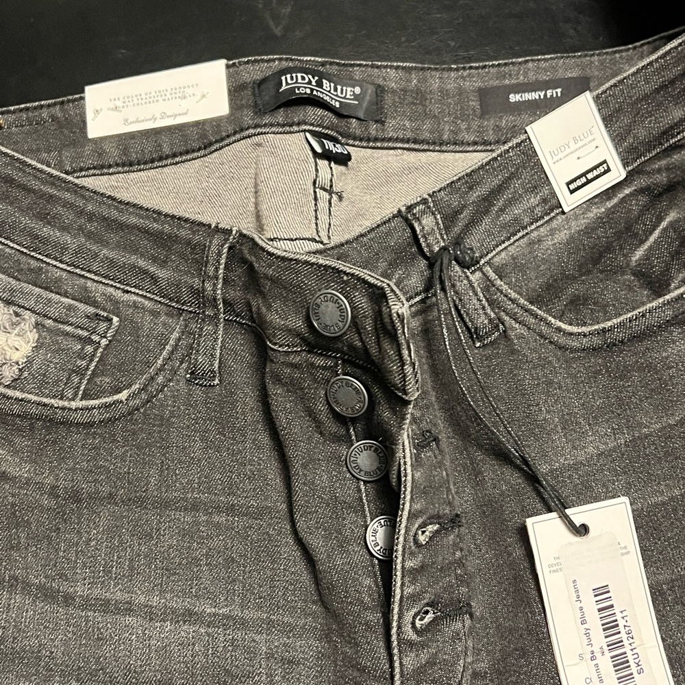 Judy, blue jeans, size 11, high waisted,button fly black washed color